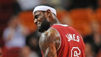 Next Story Image: Watch LeBron James get really mad at Mario Chalmers during a timeout